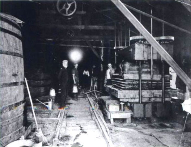 James and family operating the estate wine press in the 1890s